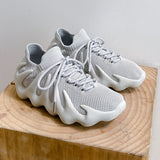 Chaussures de marche athlétiques pour hommes et femmes Chaussures de noix de coco Chaussures de boulettes de course